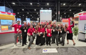 The Bibliotheca team gathers at Booth 1818 during ALA 2026 in Chicago