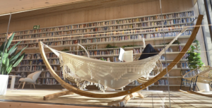 person resting reading a book in a hammock with a bookshelves at gabriel garcía márquez library
