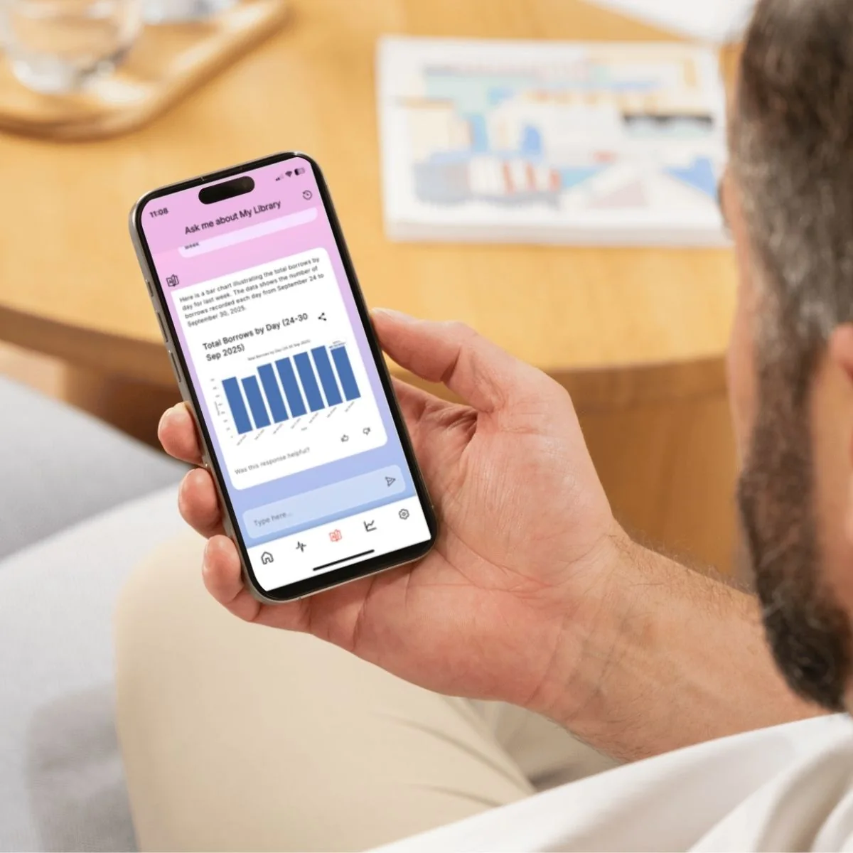 libraryConnect LINK mobile app showing AI Insights with borrowing data and a chart