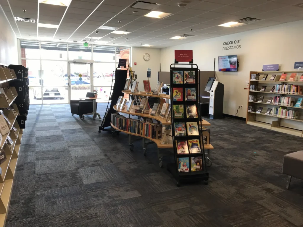 Interior of Jefferson County Public Library Express Library showing self-service layout, shelving, and technology-enabled spaces