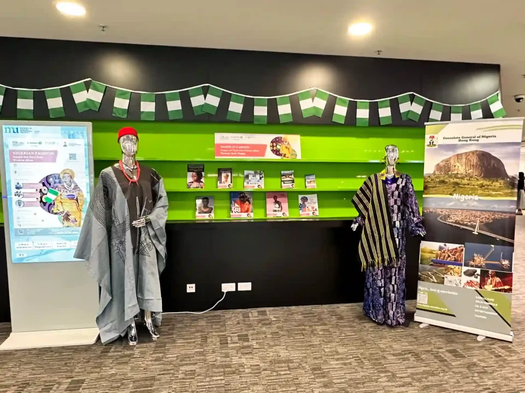 Visitors viewing a cultural clothing exhibition at HKMU Library