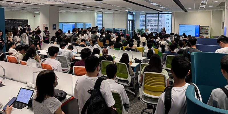 Large audience attending an event at HKMU Library