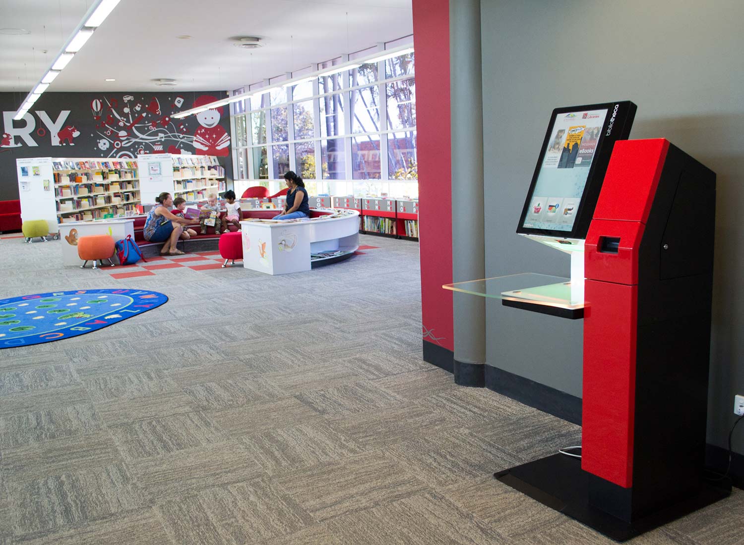 RFID in Libraries 12 Red selfcheck 1000 in Bundaberg library