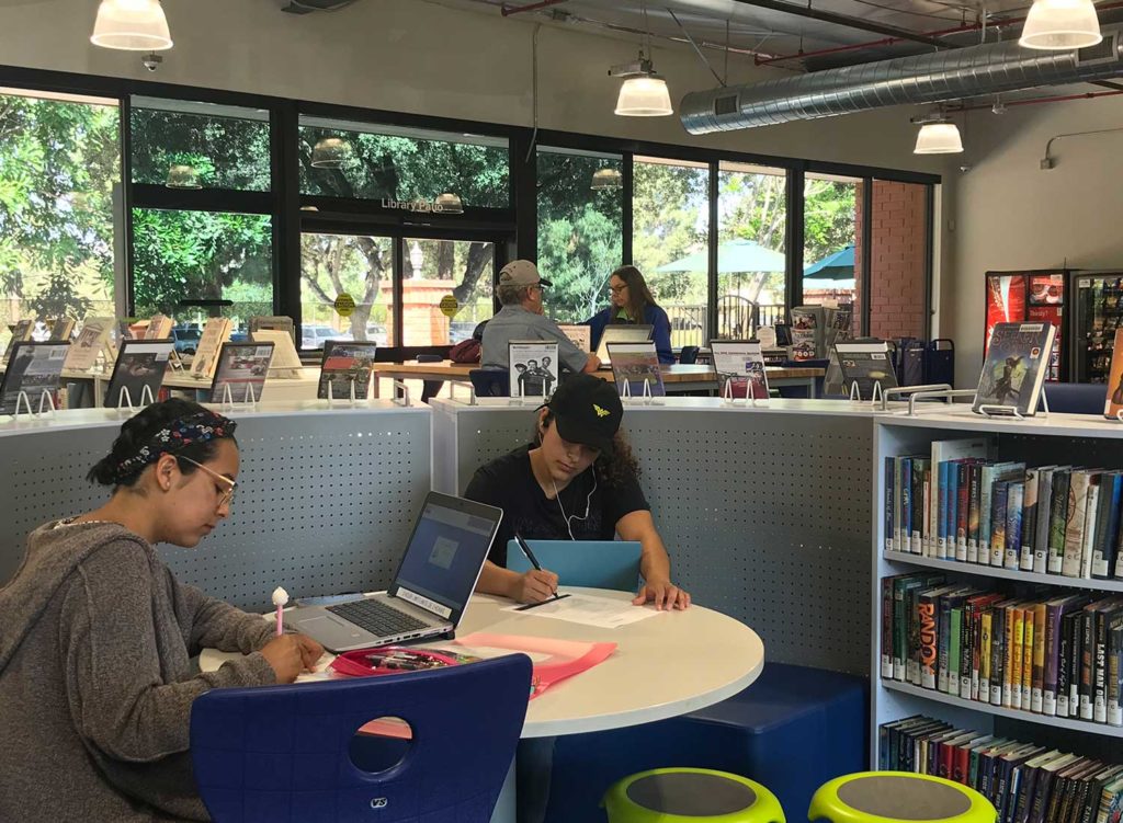 Teenagers studying in Ventura library