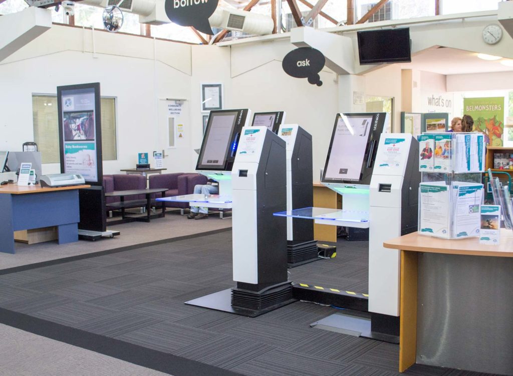 Ruth Faulkner Public Library - Three selfcheck 1000 kiosks in ruth faulkner library