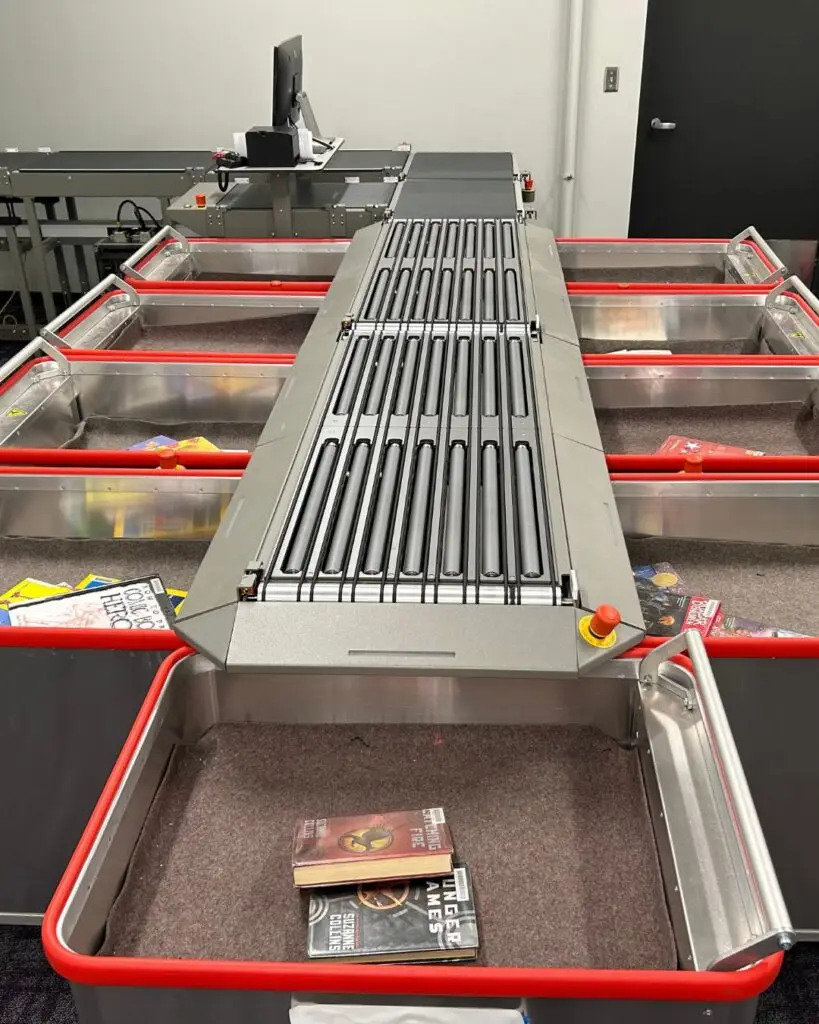 Automated materials handling system sorting returned library items to streamline circulation workflows.
