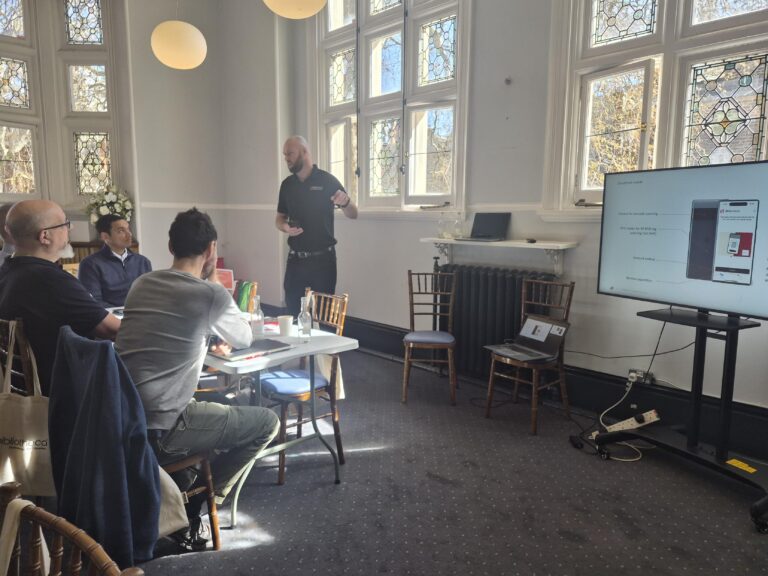 Library staff exploring cloudCheck Mobile during a hands-on session at the London/South Roadshow, Mayfair Library.