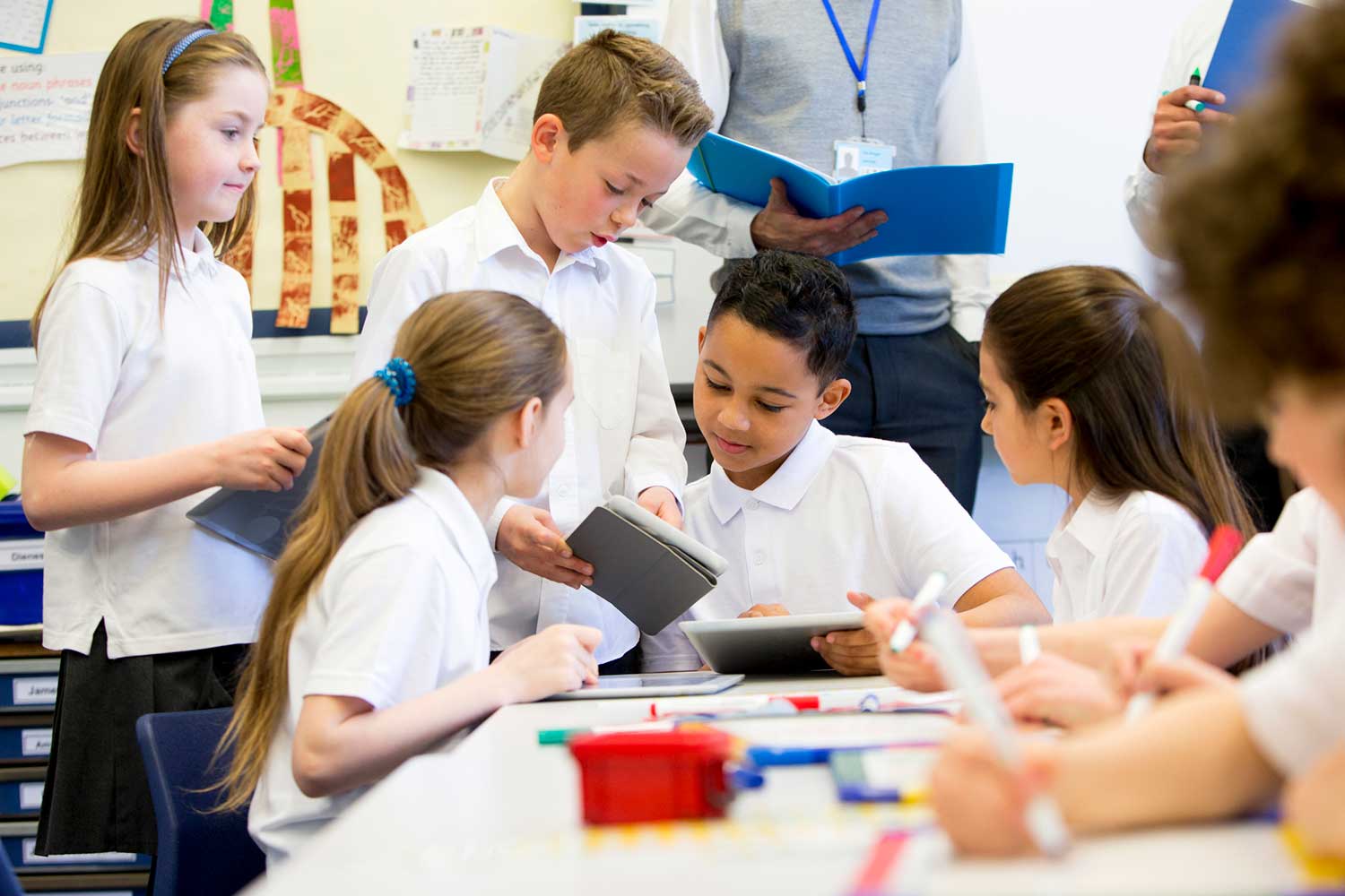 children reading in a classroom