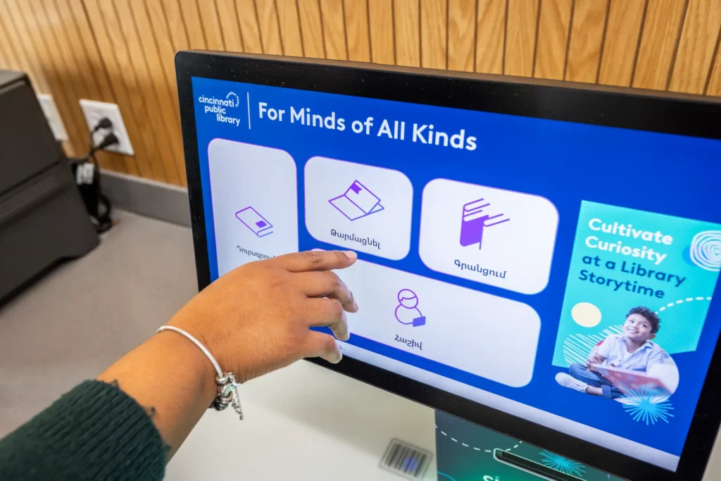 Patron using the multilingual quickConnect interface at Cincinnati Public Library