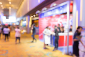 Abstract blurred event exhibition with people background, business convention