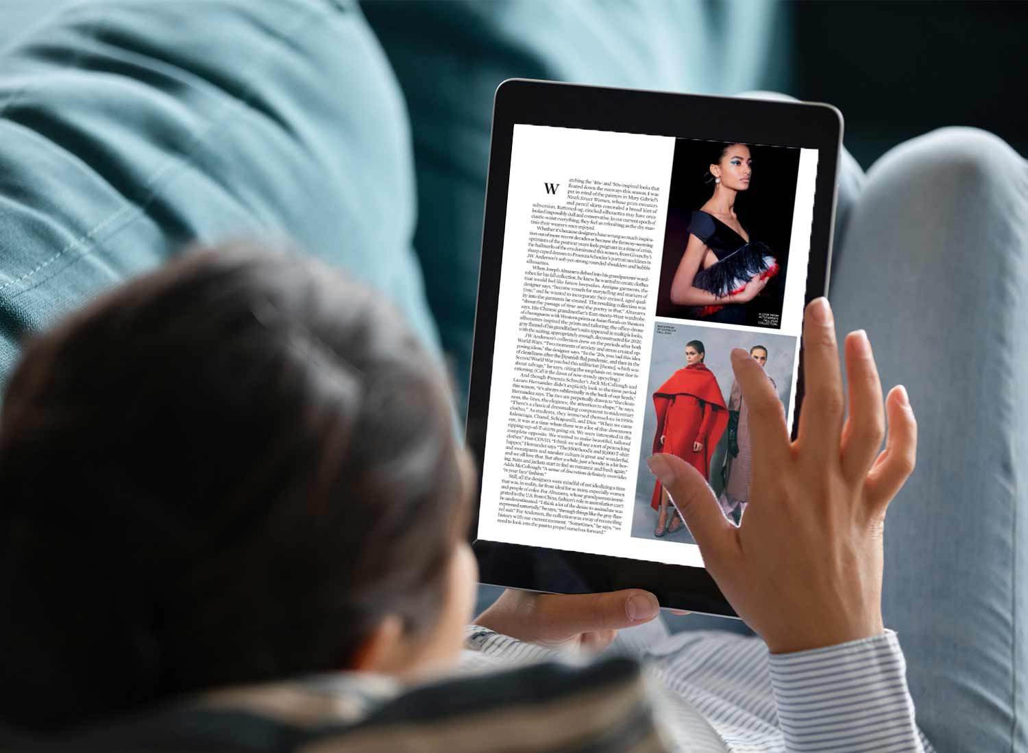 Lady reading a magazine on the couch