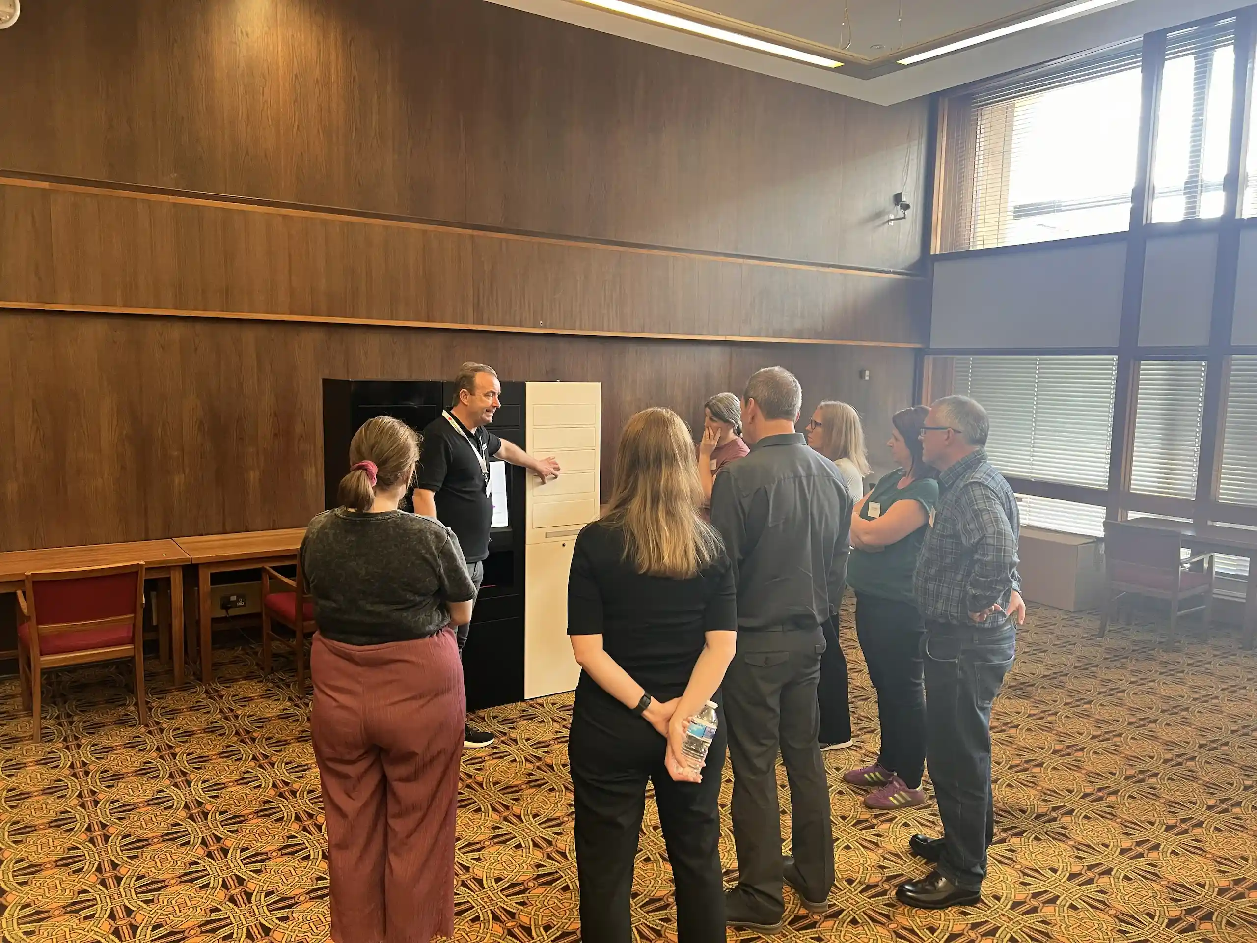 Presenter demonstrating the Bibliotheca remoteLocker solution to library professionals in Glasgow.