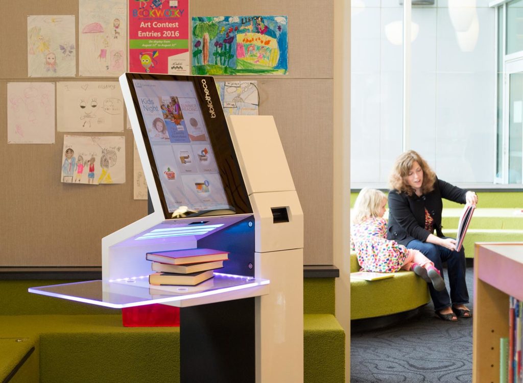 library selfCheck with storytime in background